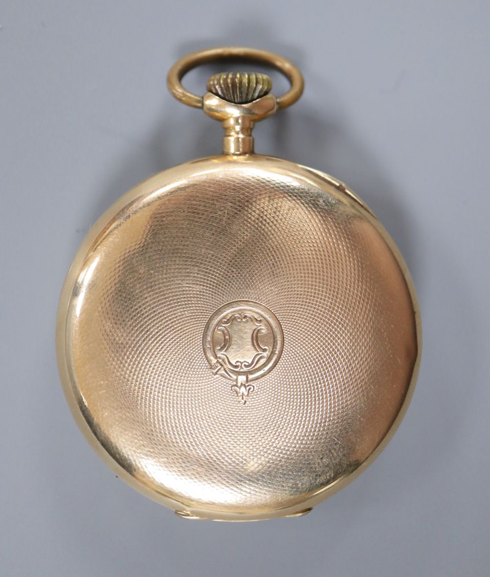An early 20th century continental 14k open face keyless pocket watch, with Arabic dial and subsidiary seconds,